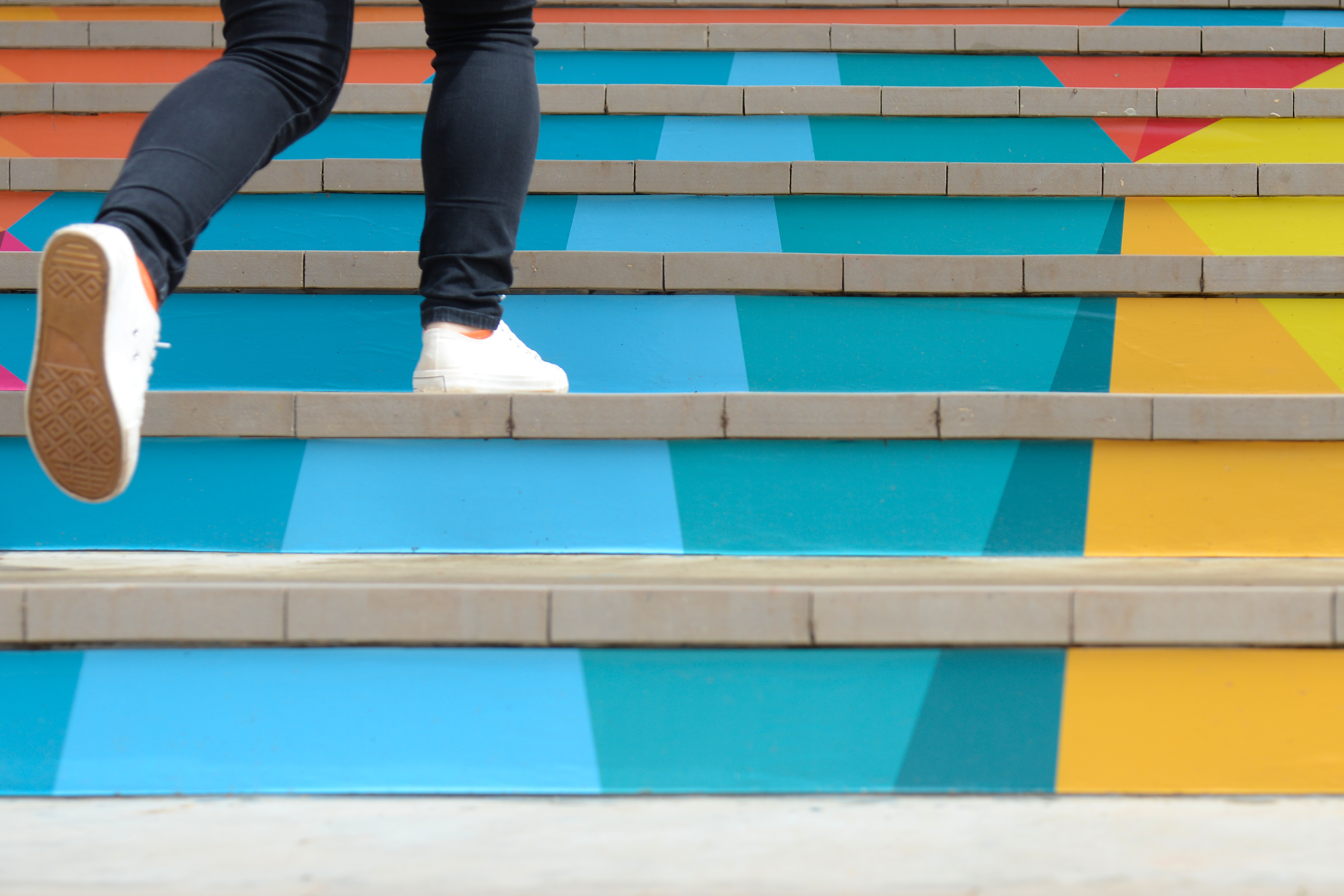 Radical Walking up colorful stairs